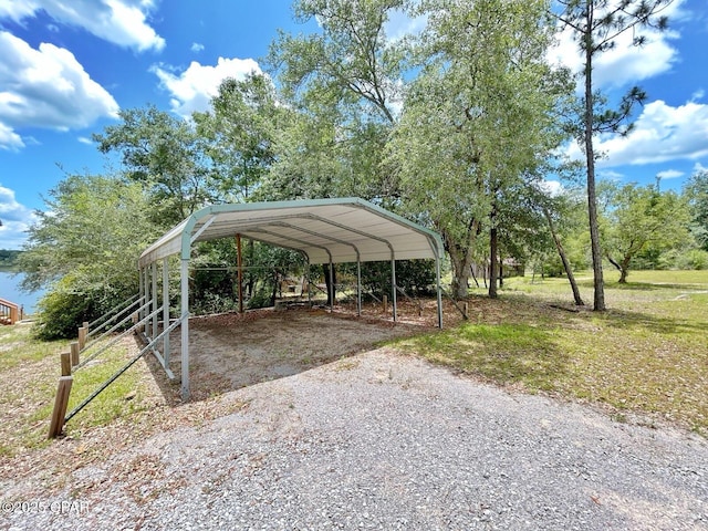 992 Hammond Lake Dr, Fountain, FL 32438 - view of car parking featuring gravel driveway and a carport