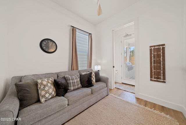 309 Tanaga St, Panama City Beach, FL 32413 - living area featuring wood finished floors and baseboards