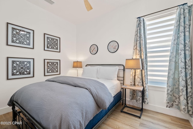 309 Tanaga St, Panama City Beach, FL 32413 - bedroom with wood finished floors and ceiling fan