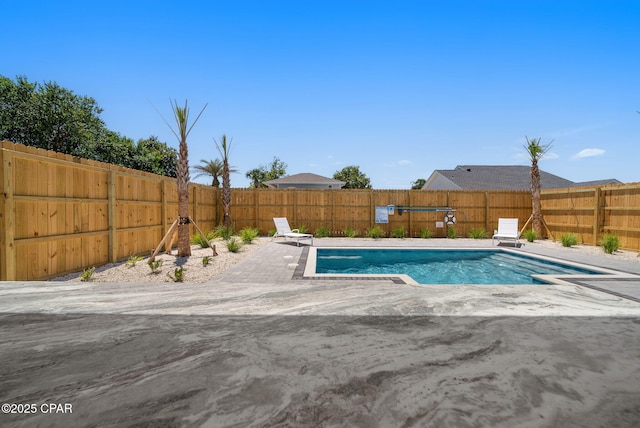 309 Tanaga St, Panama City Beach, FL 32413 - view of pool featuring a fenced backyard and a patio area
