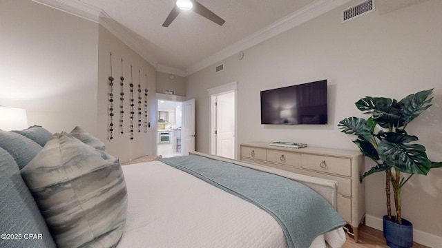 11807 Front Beach Rd Unit 2204, Panama City Beach, FL 32407 - bedroom with crown molding, light wood finished floors, baseboards, and a ceiling fan