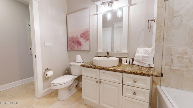 11807 Front Beach Rd Unit 2204, Panama City Beach, FL 32407 - bathroom with vanity, toilet, tile patterned floors, and baseboards