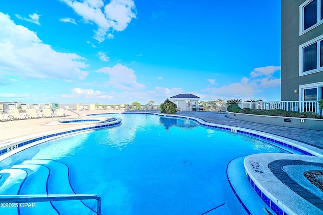 11807 Front Beach Rd Unit 2204, Panama City Beach, FL 32407 - community pool featuring a patio area