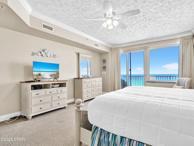 7115 Thomas Dr Unit 602, Panama City Beach, FL 32408 - bedroom with carpet flooring, access to outside, crown molding, a textured ceiling, and a ceiling fan