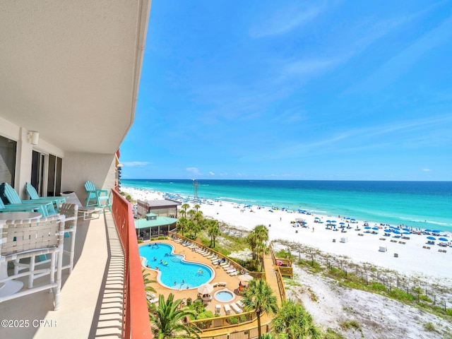 7115 Thomas Dr Unit 602, Panama City Beach, FL 32408 - balcony with view of water and beach and view of pool