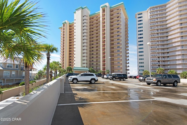 7115 Thomas Dr Unit 602, Panama City Beach, FL 32408 - view of property with uncovered parking