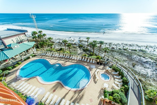 7115 Thomas Dr Unit 602, Panama City Beach, FL 32408 - community pool featuring view of water and beach