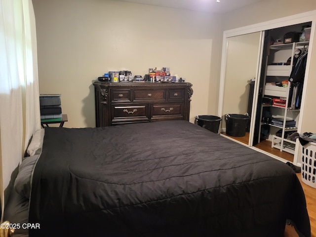 4881 Tall Pine Dr, Marianna, FL 32446 - bedroom featuring wood finished floors and a closet
