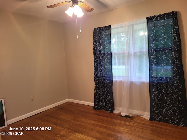 4881 Tall Pine Dr, Marianna, FL 32446 - unfurnished room with ceiling fan and wood finished floors