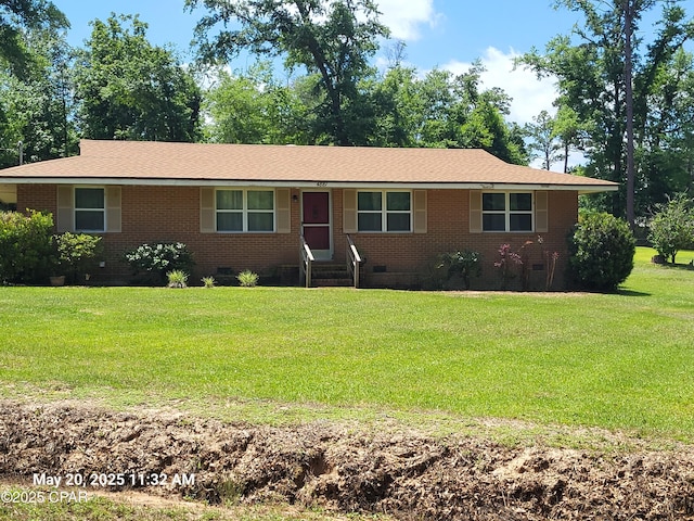 4881 Tall Pine Dr, Marianna, FL 32446 - ranch-style home featuring crawl space, brick siding, and a front lawn