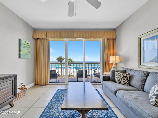 15817 Front Beach Rd Unit 1-204, Panama City Beach, FL 32413 - living room with light tile patterned flooring, a water view, and ceiling fan