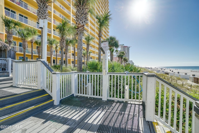 15817 Front Beach Rd Unit 1-204, Panama City Beach, FL 32413 - wooden deck with a water view