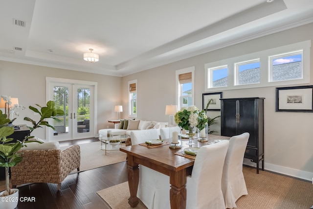 118 Ravine Rd, Inlet Beach, FL 32461 - living area featuring a tray ceiling, dark wood-style flooring, crown molding, and french doors