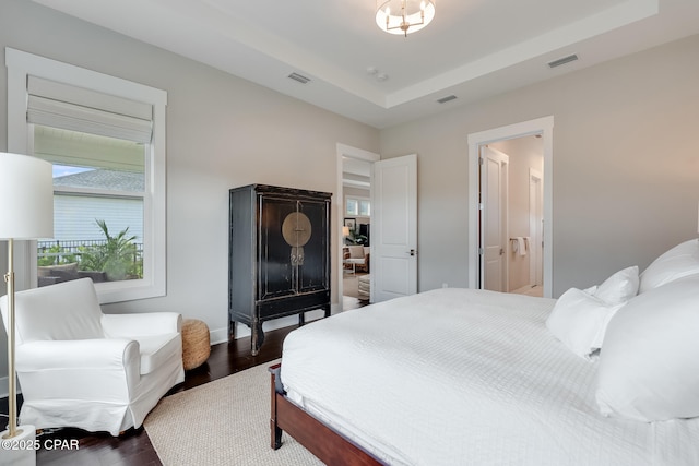 118 Ravine Rd, Inlet Beach, FL 32461 - bedroom with wood finished floors and a raised ceiling