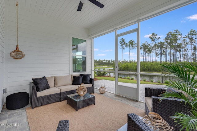 118 Ravine Rd, Inlet Beach, FL 32461 - sunroom with a water view, a ceiling fan, and outdoor lounge area