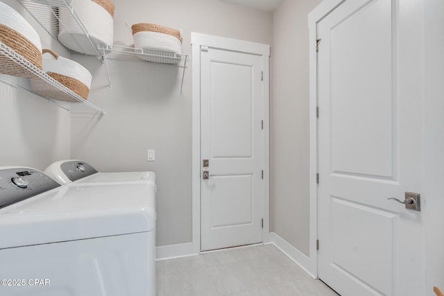 118 Ravine Rd, Inlet Beach, FL 32461 - laundry area with washing machine and dryer and light tile patterned floors
