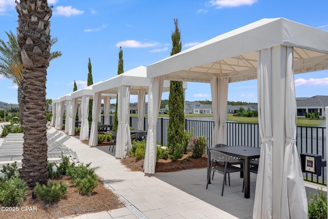 118 Ravine Rd, Inlet Beach, FL 32461 - view of patio / terrace featuring a water view and outdoor dining area