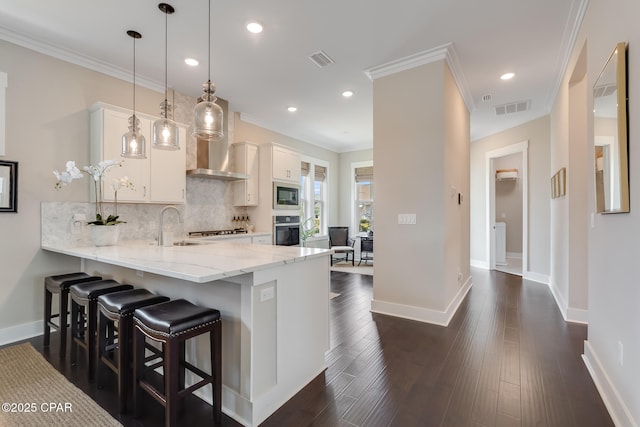 118 Ravine Rd, Inlet Beach, FL 32461 - kitchen featuring oven, built in microwave, backsplash, a peninsula, and light stone countertops