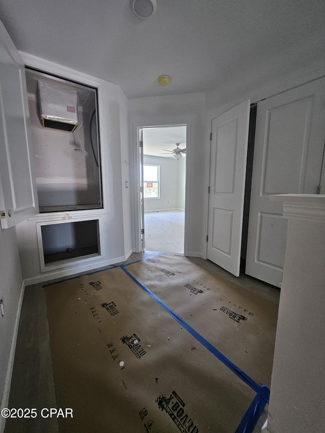 7682 Solana Ln Unit 55, Panama City Beach, FL 32407 - hall featuring baseboards