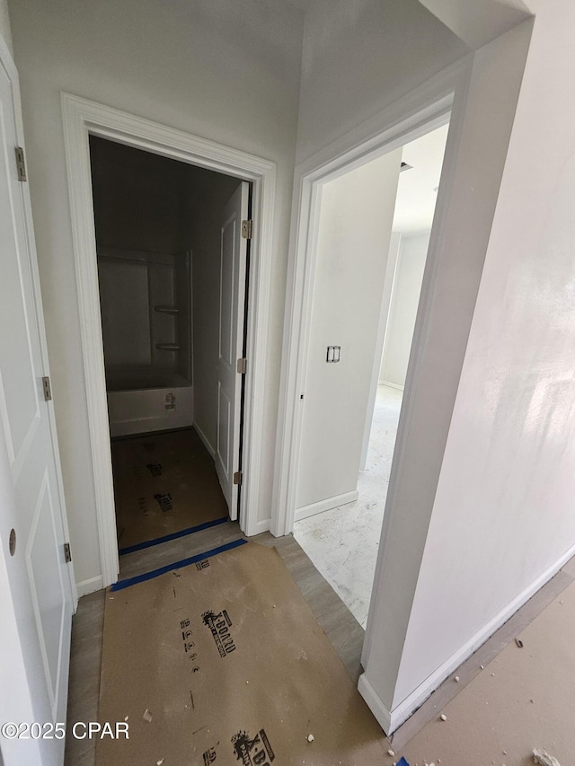 7682 Solana Ln Unit 55, Panama City Beach, FL 32407 - hall featuring baseboards