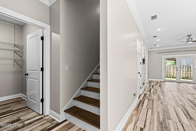 2932 Palmetto Ridge Way, Lynn Haven, FL 32444 - stairway featuring ornamental molding, recessed lighting, wood finished floors, and ceiling fan