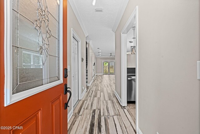 2932 Palmetto Ridge Way, Lynn Haven, FL 32444 - corridor with light wood-style floors, a textured ceiling, and ornamental molding