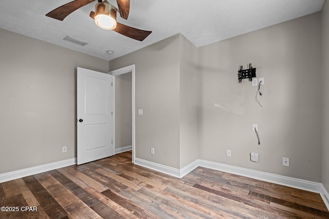 2932 Palmetto Ridge Way, Lynn Haven, FL 32444 - empty room with wood finished floors and a ceiling fan