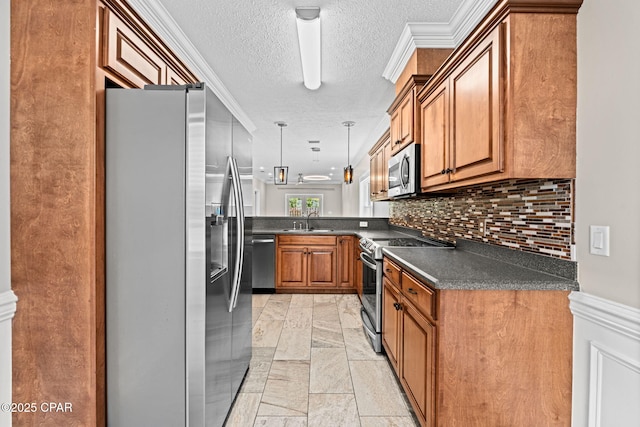 2932 Palmetto Ridge Way, Lynn Haven, FL 32444 - kitchen with stainless steel appliances, dark countertops, brown cabinetry, backsplash, and a textured ceiling