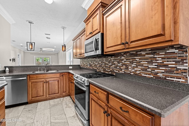 2932 Palmetto Ridge Way, Lynn Haven, FL 32444 - kitchen featuring appliances with stainless steel finishes, crown molding, brown cabinetry, dark countertops, and backsplash