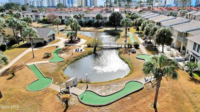 116 Damon Cir Unit C, Panama City Beach, FL 32407 - view of community featuring a putting area, a water view, and a view of city