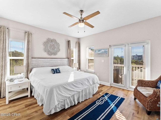 45 Eagles Lndg, Inlet Beach, FL 32461 - bedroom with access to exterior, multiple windows, wood finished floors, and ceiling fan