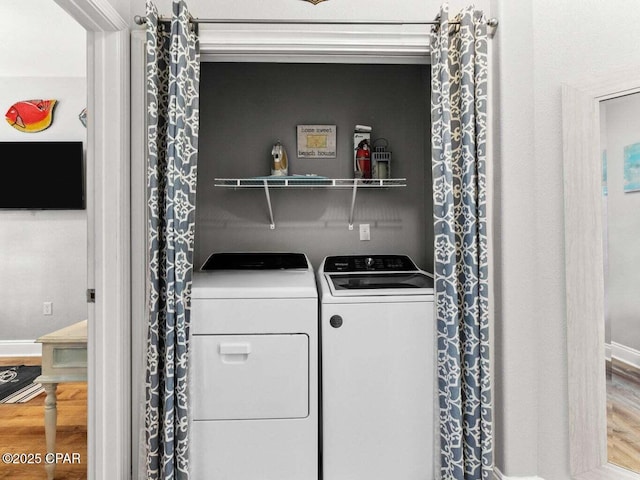45 Eagles Lndg, Inlet Beach, FL 32461 - laundry area with wood finished floors and washer and clothes dryer