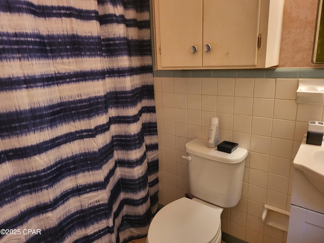 4010 Old Cottondale Rd, Marianna, FL 32448 - bathroom with tile walls, vanity, and a shower with shower curtain