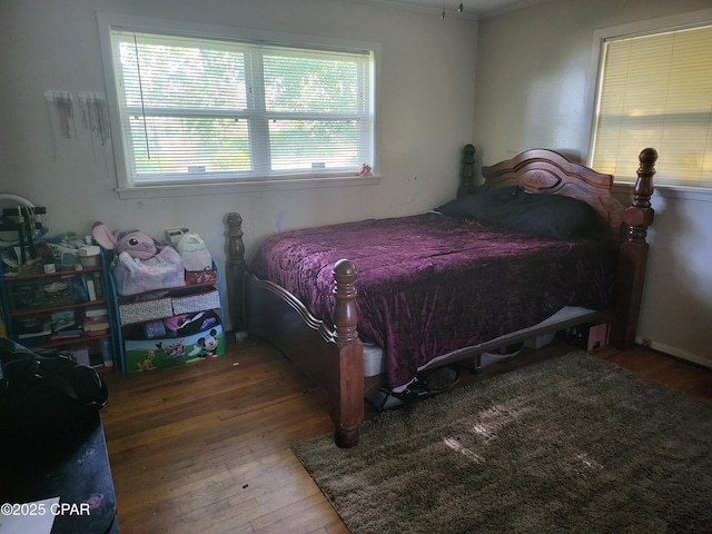 4010 Old Cottondale Rd, Marianna, FL 32448 - bedroom featuring hardwood / wood-style flooring, multiple windows, and crown molding