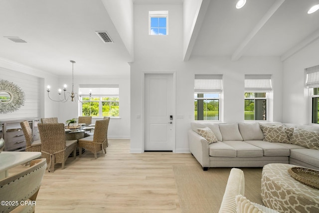 8648 Conch Shell Ct, Panama City Beach, FL 32413 - living area featuring a chandelier, light wood finished floors, and recessed lighting