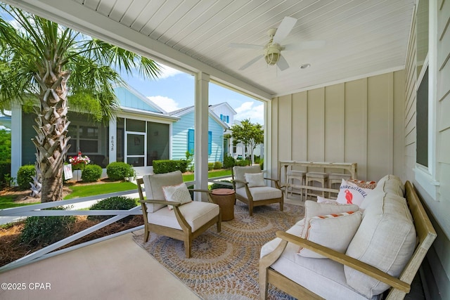 8648 Conch Shell Ct, Panama City Beach, FL 32413 - sunroom / solarium featuring a ceiling fan and an outdoor living space