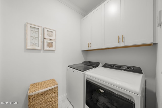 8648 Conch Shell Ct, Panama City Beach, FL 32413 - washroom featuring cabinet space, separate washer and dryer, ornamental molding, and light marble finish floors