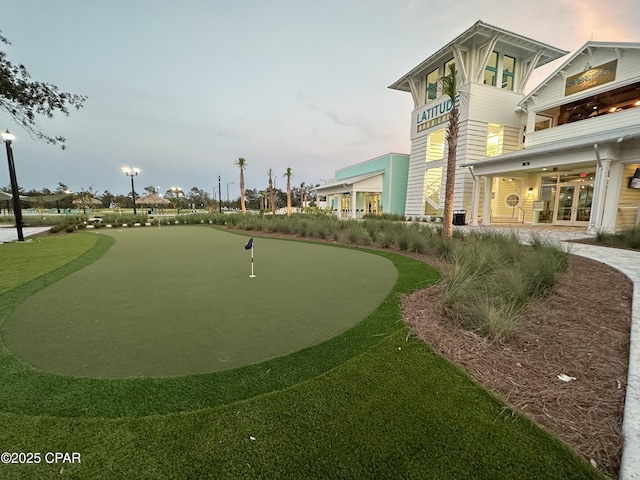 8648 Conch Shell Ct, Panama City Beach, FL 32413 - view of home's community with a putting area