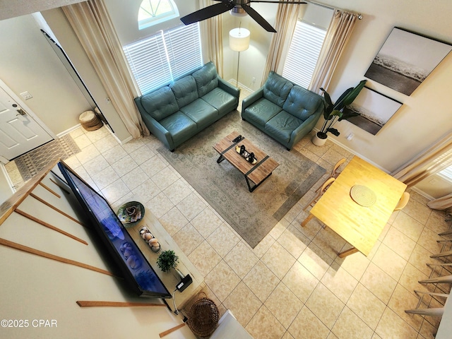 184 White Cap Way, Panama City Beach, FL 32407 - unfurnished living room featuring tile patterned flooring and ceiling fan