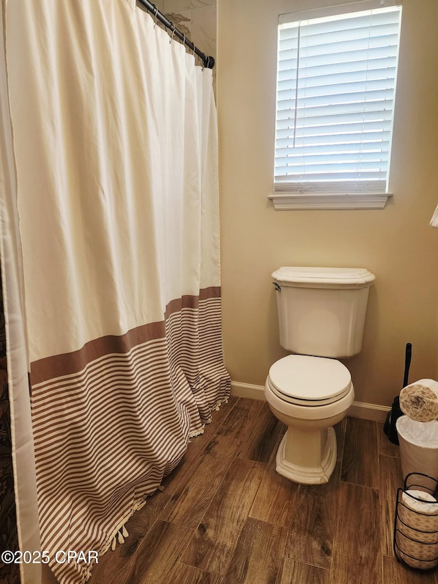 184 White Cap Way, Panama City Beach, FL 32407 - full bathroom with wood finished floors and a shower with curtain