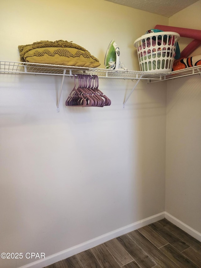 184 White Cap Way, Panama City Beach, FL 32407 - spacious closet featuring wood finished floors