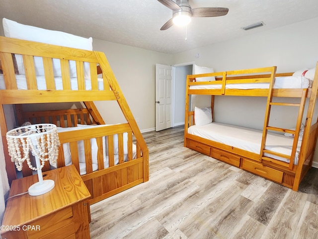 184 White Cap Way, Panama City Beach, FL 32407 - bedroom with wood finished floors and baseboards