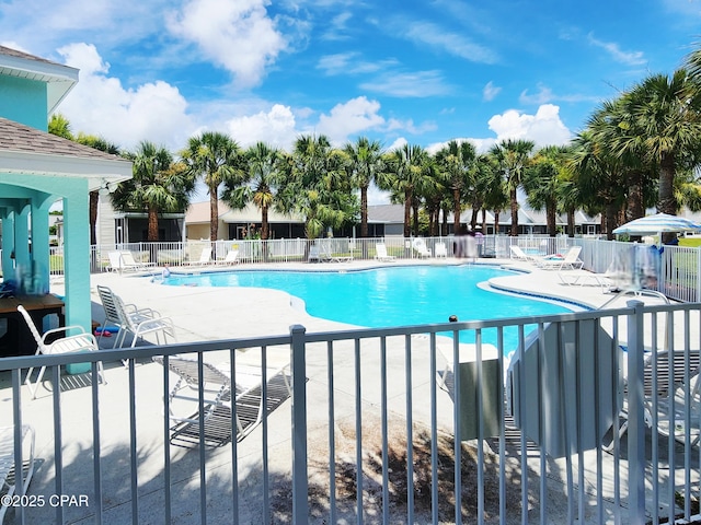 184 White Cap Way, Panama City Beach, FL 32407 - community pool featuring a patio