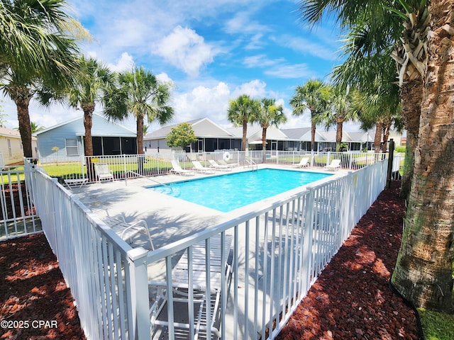 184 White Cap Way, Panama City Beach, FL 32407 - community pool featuring a patio area