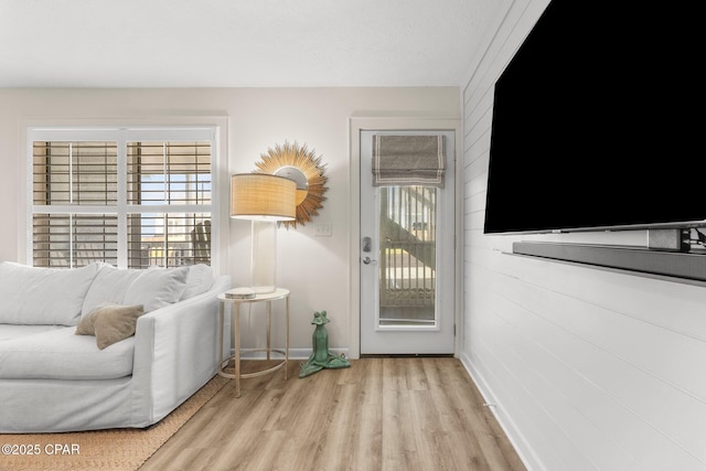17642 Front Beach Rd Unit B1, Panama City Beach, FL 32413 - living area featuring baseboards and wood finished floors