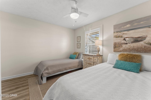 17642 Front Beach Rd Unit B1, Panama City Beach, FL 32413 - bedroom with wood finished floors and ceiling fan