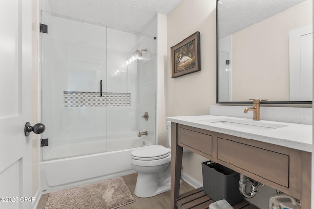 17642 Front Beach Rd Unit B1, Panama City Beach, FL 32413 - bathroom with vanity, a textured ceiling, shower / bath combination, and wood finished floors
