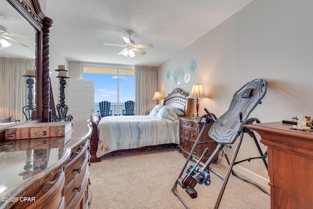 10811 Front Beach Rd Unit 2304, Panama City Beach, FL 32407 - carpeted bedroom with a ceiling fan and a textured ceiling