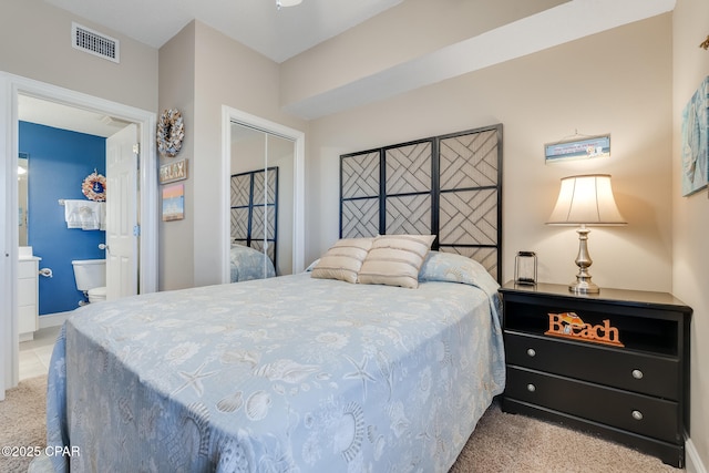10811 Front Beach Rd Unit 2304, Panama City Beach, FL 32407 - bedroom featuring carpet flooring, a closet, and ensuite bathroom