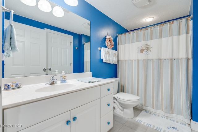 10811 Front Beach Rd Unit 2304, Panama City Beach, FL 32407 - bathroom featuring vanity, tile patterned flooring, a textured ceiling, and a shower with shower curtain